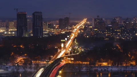 Time lapse of sunset over bridge Metro Stock Footage 87929701