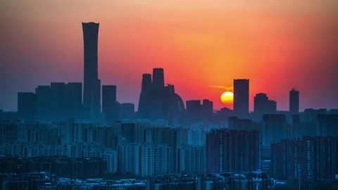 Time-lapse of the sunset over the building complex in Beijing, China Stock Footage 300117702