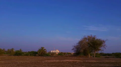 Time lapse of sunset over the bushehr nuclear power plant, bushehr,iran Video stock 33448500