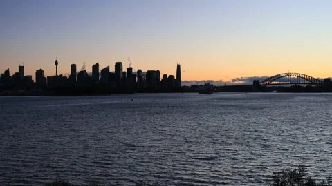 Time lapse sunset over City of Sydney from Bradleys head as 4k. Stock Footage 137855435
