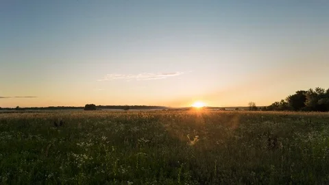 Time lapse. Sunset over the field. Stock Footage 77626581