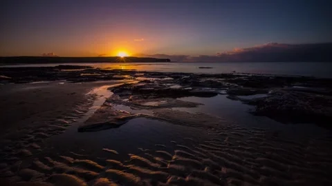 Time Lapse at Sunset Over the Hole of Rowe Near Skara Brae in Sandwick Orkney 動画素材 253323069