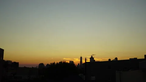 Time-lapse sunset over Manhattan looking from Brooylyn Stock Footage