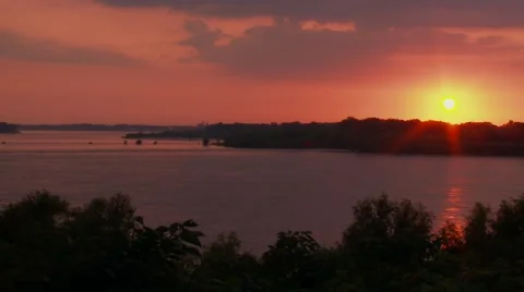 Time lapse of sunset over Mississippi River, Summer Stock Footage 52864092