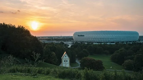 Time lapse sunset over Munich, Germany with the front view of Allianz Arena Stock Footage 162698554