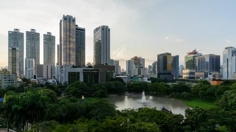Time lapse of sunset over the park in the middle of business district Stock Footage 112530595