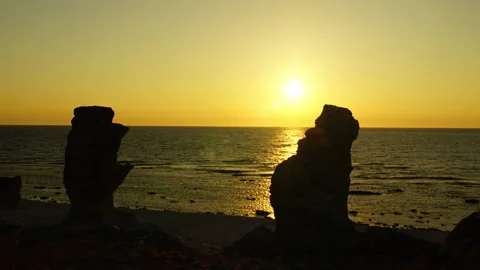 Time-lapse sunset over Rauk rock formation on Fårö Island, Gotland, Sweden Stock Footage 147568000