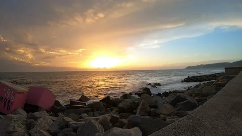 Time lapse at sunset over the sea	 Stock Footage 218983826