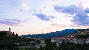Time Lapse of Sunset Over Small Italian Town and Landscape Stock Footage 85862331