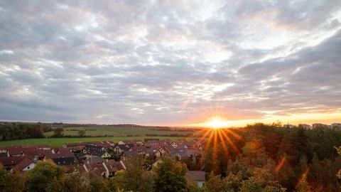 Time lapse of a sunset over the small town Stock Footage 123282102