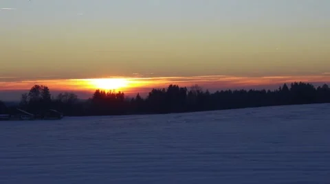 Time lapse of sunset over snow landscape Stock Footage 47223628