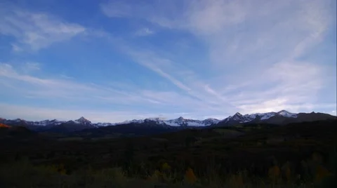 Time lapse sunset over a snow covered mountain range in Colorado. Stock Footage 55831092