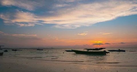 Time lapse: sunset over tropical beach and sea colorful dramatic sky moving clou Stock Footage 107986476