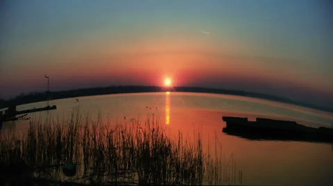 Time lapse sunset over water, fish eye Video stock 22826627