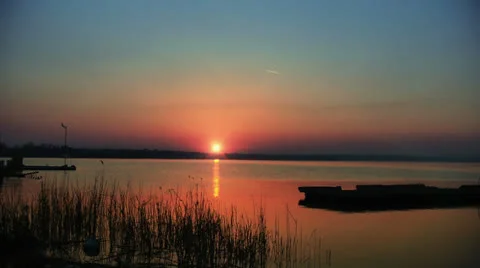 Time lapse sunset over water Video stock 23141024