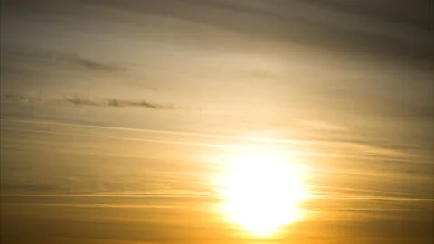 Time lapse. Sunset pastel sky with soft pink and orange clouds setting sun. Stock Footage 133811043