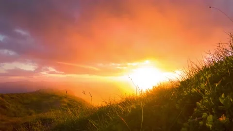 Time lapse of sunset at the peak of high mountain Stock Footage 144342131