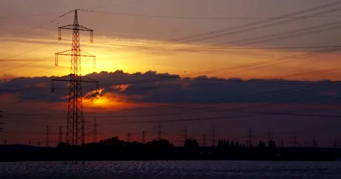 TIME LAPSE sunset with power poles and birds Stock Footage 63611949