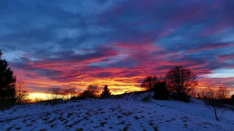 Time lapse sunset with red reflection on mountain range Stock Footage 83945029