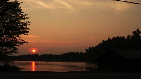 Time-lapse of a sunset on a river in Maine. Stock Footage 147946577