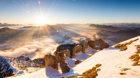 Time Lapse - Sunset at a ruin with a view down the mountain Stock Footage 99352546