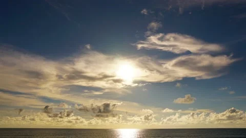 Time lapse sunset sea cloud variance sunny skyline blue sky background Video stock 153378001