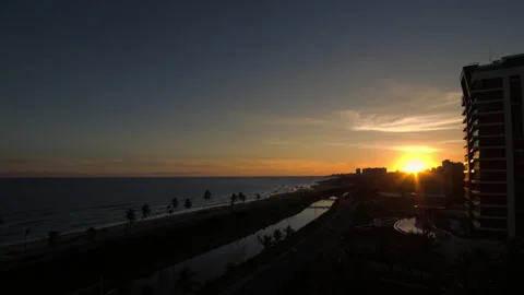 Time-lapse of the sunset at a seaside road. Jaguaribe, Salvador, Bahia, Brazil. Stock Footage