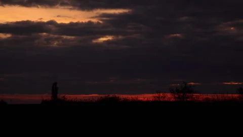 Time lapse of a sunset shot from a field 库存影片 229481806
