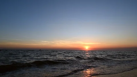 Time-lapse Sunset sky on the beach Stock Footage 106926935