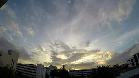 Time lapse of sunset sky changing with silhouette building on the foreground Stockbeeldmateriaal 92527431