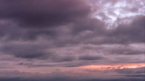 Time lapse. Sunset sky. Heavy gray and purple rainy clouds moving on the sky Stock-Footage 169886018