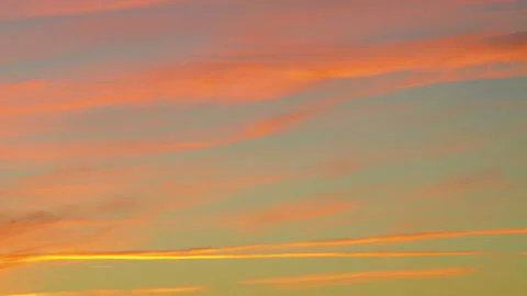 Time-lapse sunset sky with running clouds is painted in burgundy color Stock Footage 156465321
