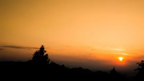 Time lapse of sunset sky turning dark during sunset Stock Footage 77815517
