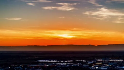 Time-lapse of sunset, small town and dramatic sky at dusk in Germany Stock Footage 147307032