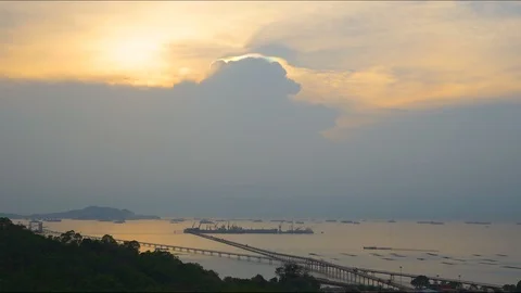 Time lapse sunset smooth clound with sea background  foregound green mountain Stock Footage 107994927