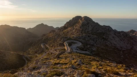 Time lapse of Sunset in spanish mountain panorma with road  island of Mallorca Stock Footage 341557377