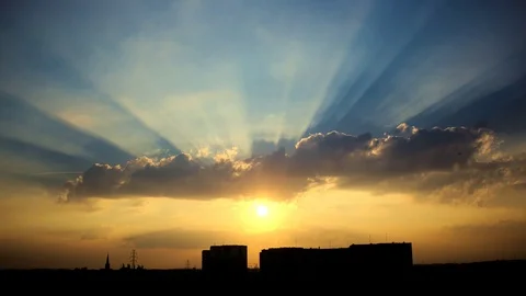 Time lapse sunset sunbeams and clouds Stock Footage 69840386