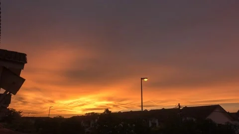 Time-lapse of sunset, sunrays, blue sky at Saujana Utama Sungai Buloh, Selangor Stock Footage 229444362