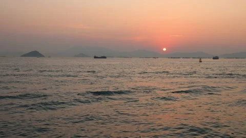 Time lapse of sunset view at Victoria Harbour at West Kowloon Waterfront Prom Stock Footage 209260126