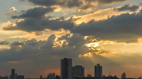 Time-lapse of the sunsets behind drifting clouds Stock Footage 321628980