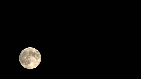 Time Lapse of Super Moon Rising and an airplane flying past. Video stock 43738794