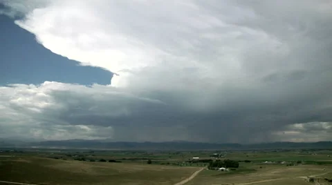 Time Lapse of Supercell Rolling off Rocky Mountains Stock Footage 54726228