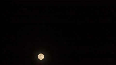 Time lapse of  supermoon and also a partial lunar eclipse. Stock Footage 156542174