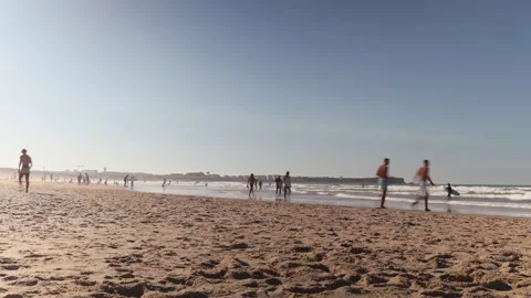 Time lapse of surfer beach on a sunny summer afternoon. Peniche, Portugal. Video stock 242760132