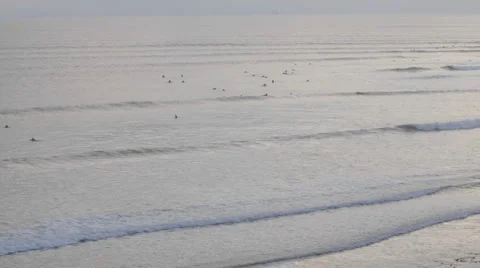 Time lapse of surfers catching set waves at Ventura Point in Ventura Stock Footage 1019508