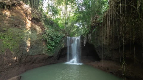 Time Lapse of Suwat Waterfall, River and Forest in Bali Indonesia Stock Footage 137987259