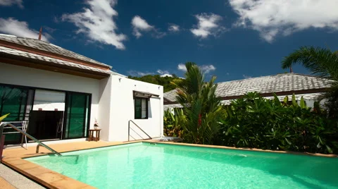 Time lapse of swimming pool and blue sky with clouds in the villa. Thailand Stock Footage 49294723