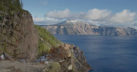Time Lapse of swirling winds brushing across the surface of Crater Lake Stock Footage 168209653