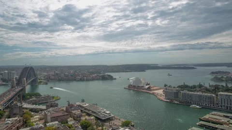 Time Lapse of Sydney Harbour Bridge and Opera House Overlooking Waterfront Skyli Stock Footage 341672689