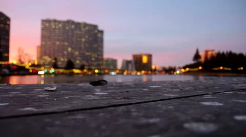 Time lapse taken looking over Lake Merritt at dusk, shallow depth of field Video stock 42734149